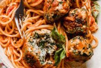 Wholesome Turkey Spinach Meatballs Over Spaghetti