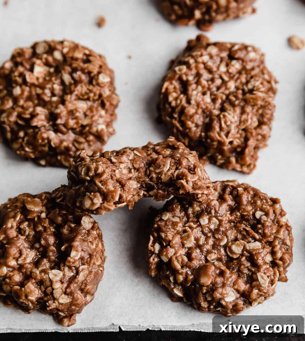 A chocolate peanut butter no bake cookie with a bite taken out, showcasing its soft and chewy texture.