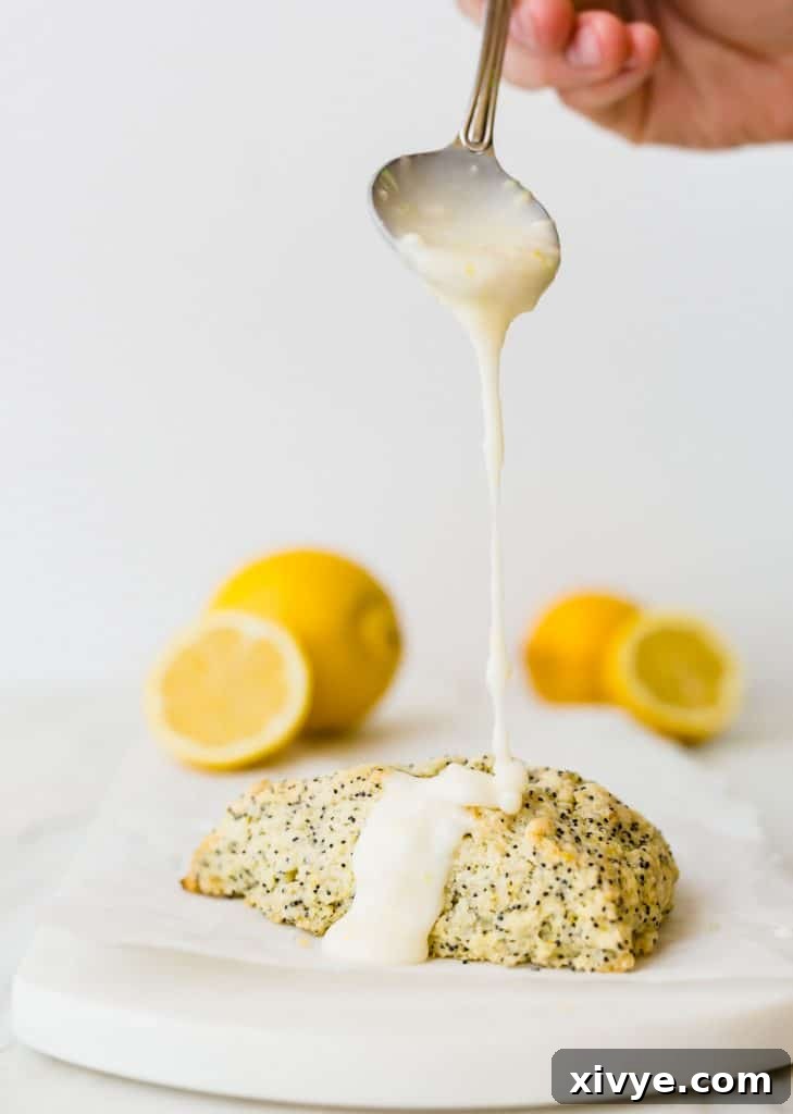 Sunshine Lemon Poppy Scones 6 These Lemon Poppy Seed Scones are the perfect spring and summer treat! They are loaded with the perfect lemon flavor and topped with an irresistible glaze!