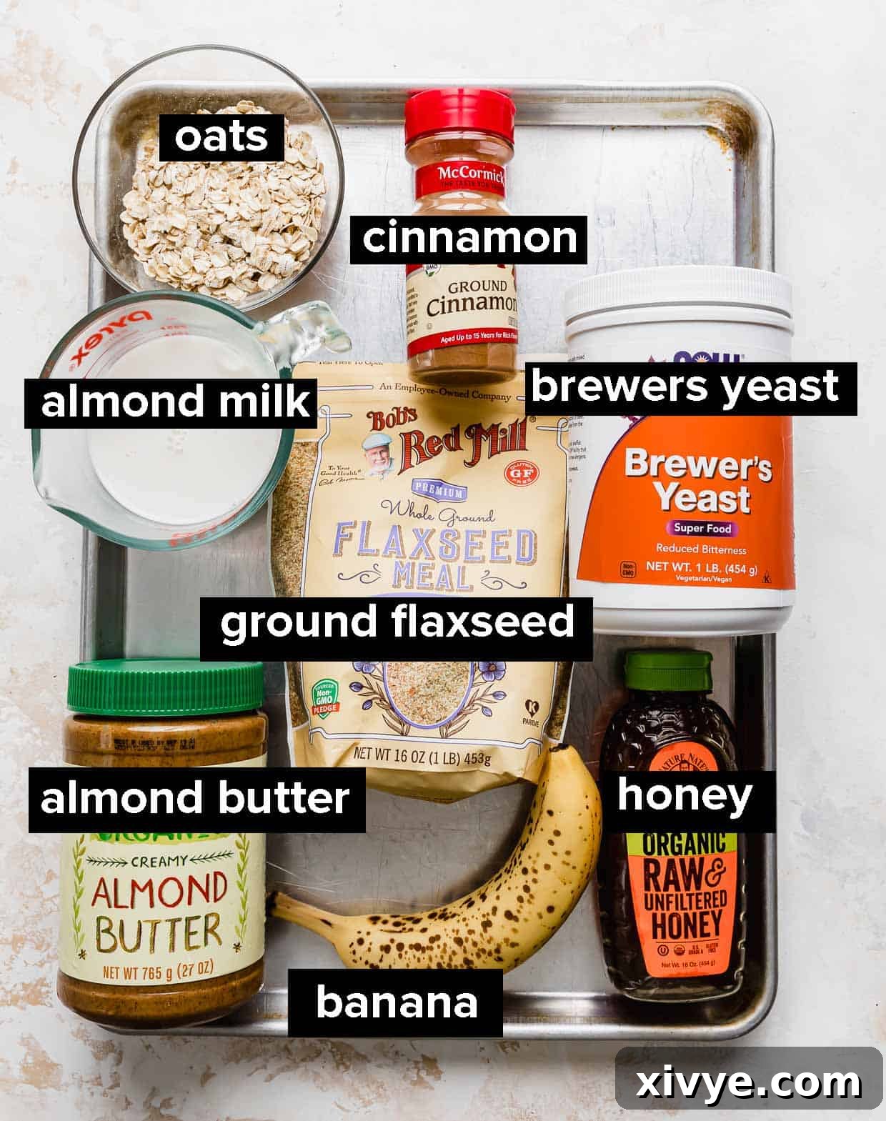 Mama's Milk Smoothie 3 Ingredients used to make a lactation smoothie, on a baking sheet.