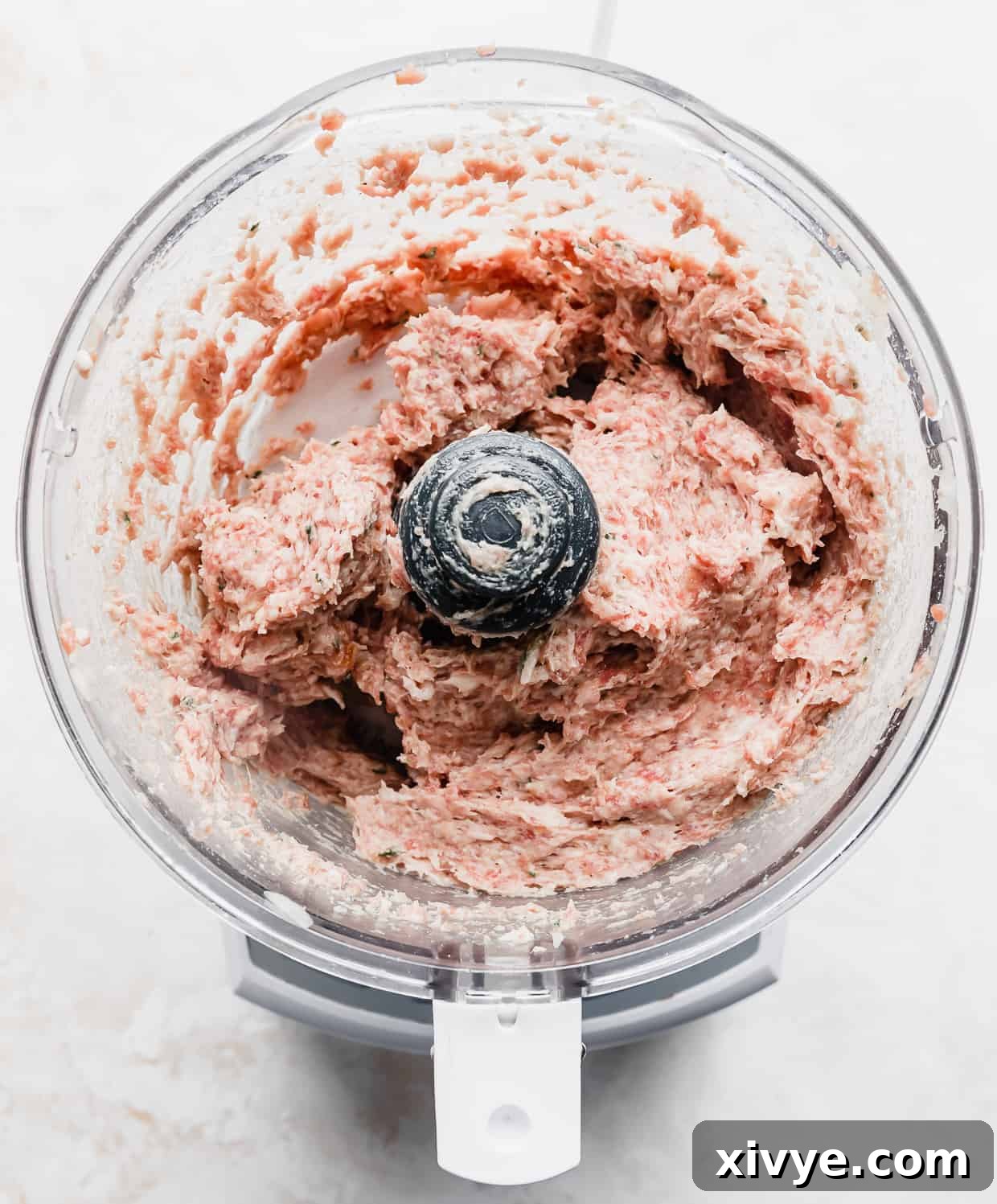 Tender Lamb Gyros 5 Ground lamb gyro meat in a food processor.