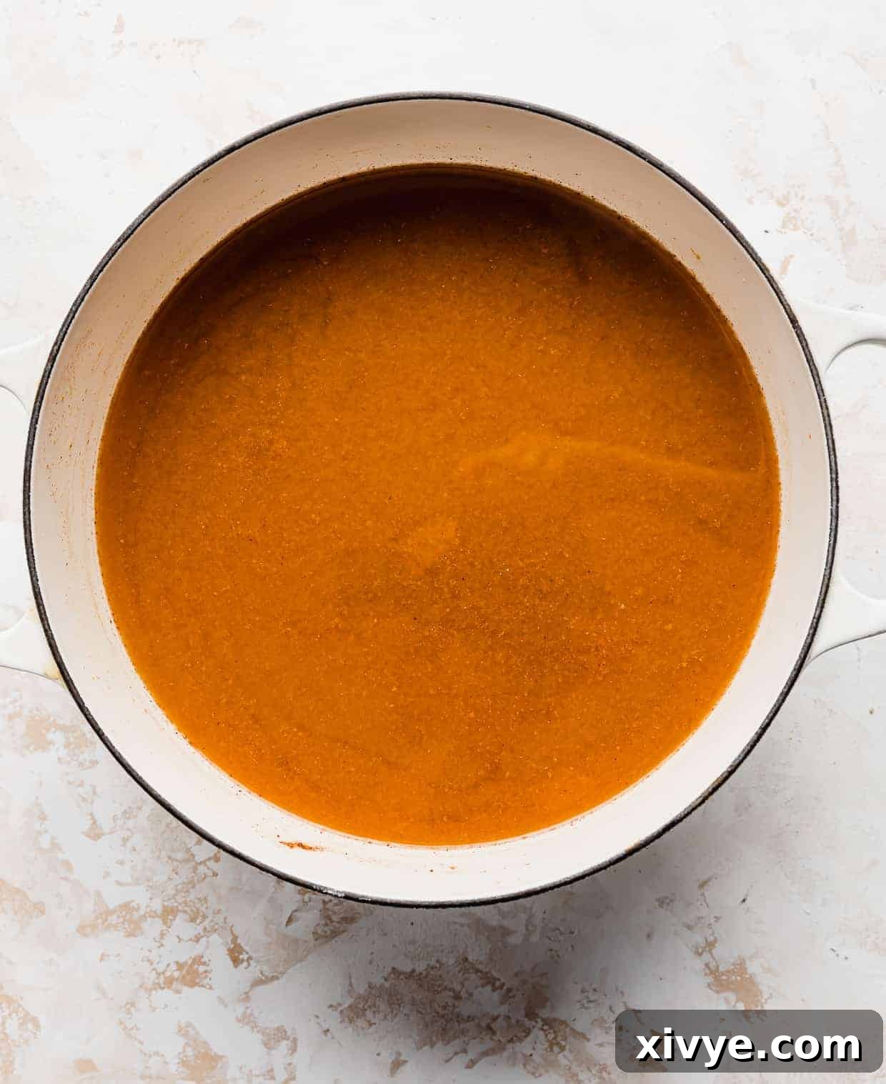 Pumpkin Juice in a large white pot. 