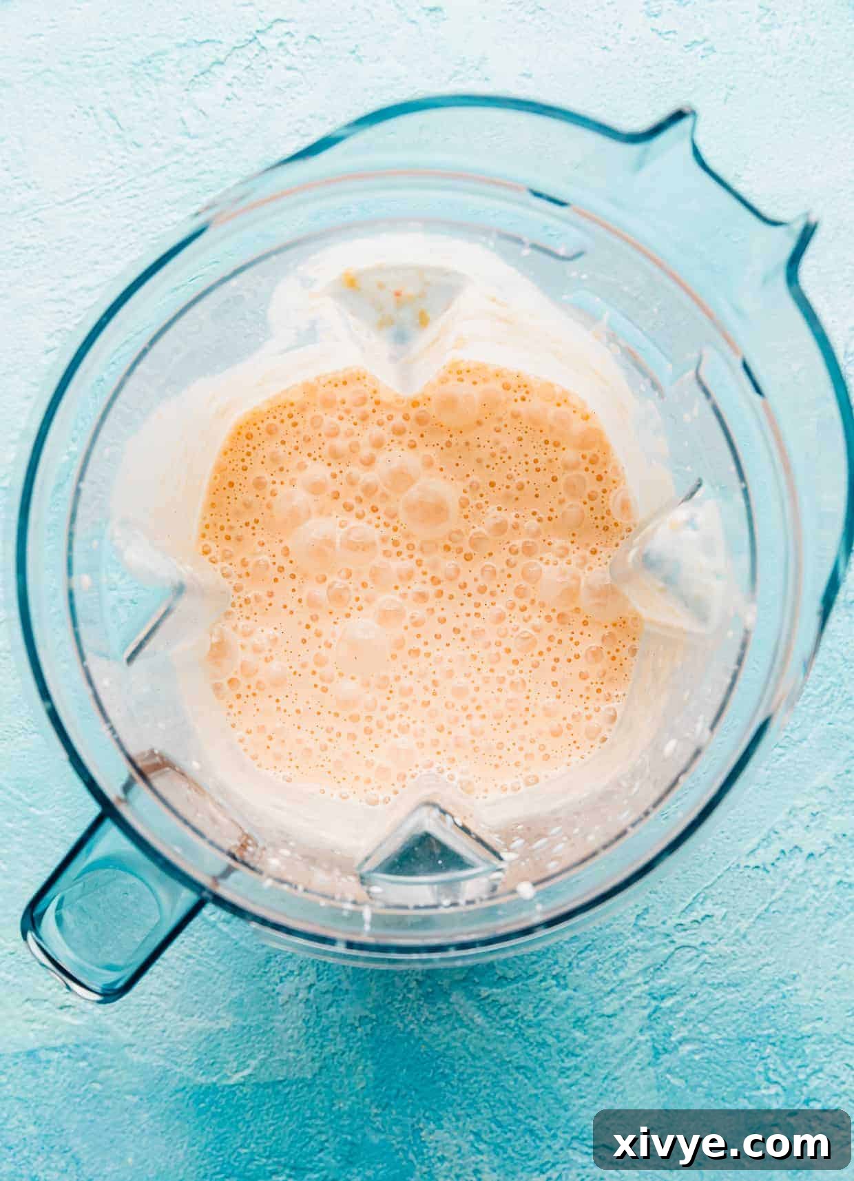 Perfect Peach Milkshake Inspired by Chick-fil-A 5 A blended peach milkshake in a blender.