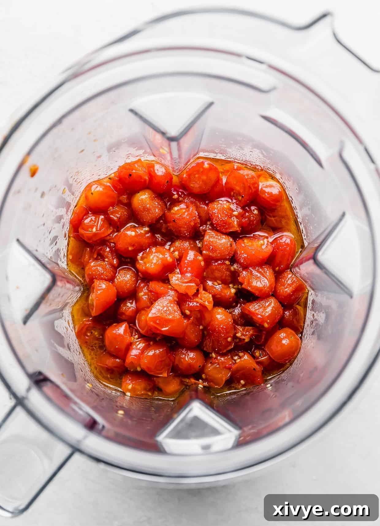 Roasted tomatoes in blender.