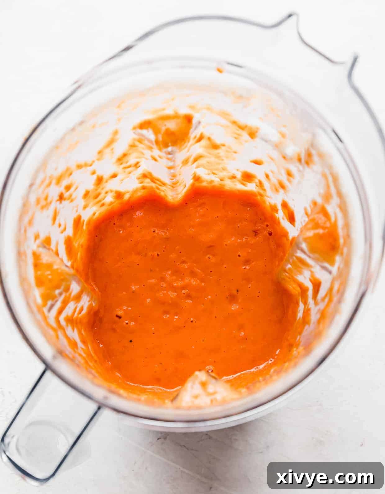 Pureed tomato sauce in a blender.