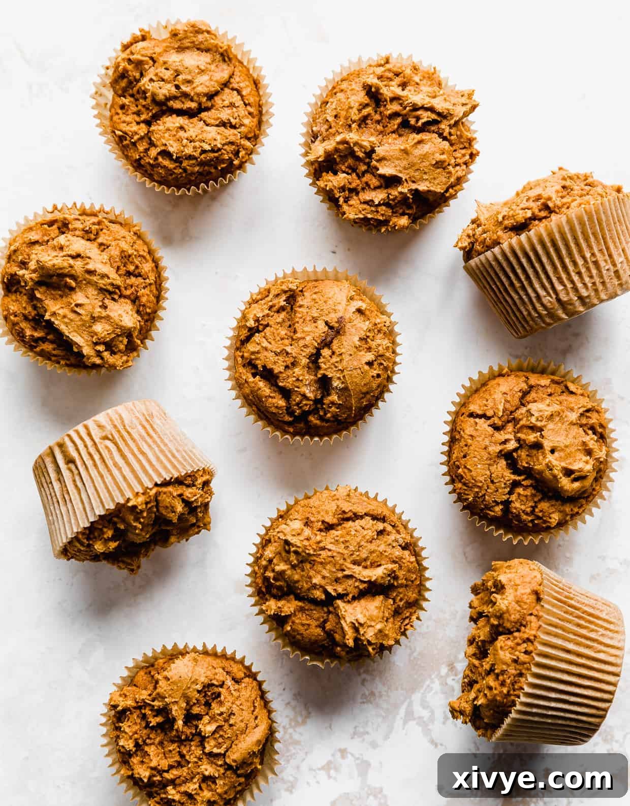 2 Ingredient Pumpkin Muffins on a white background, ready to be enjoyed.