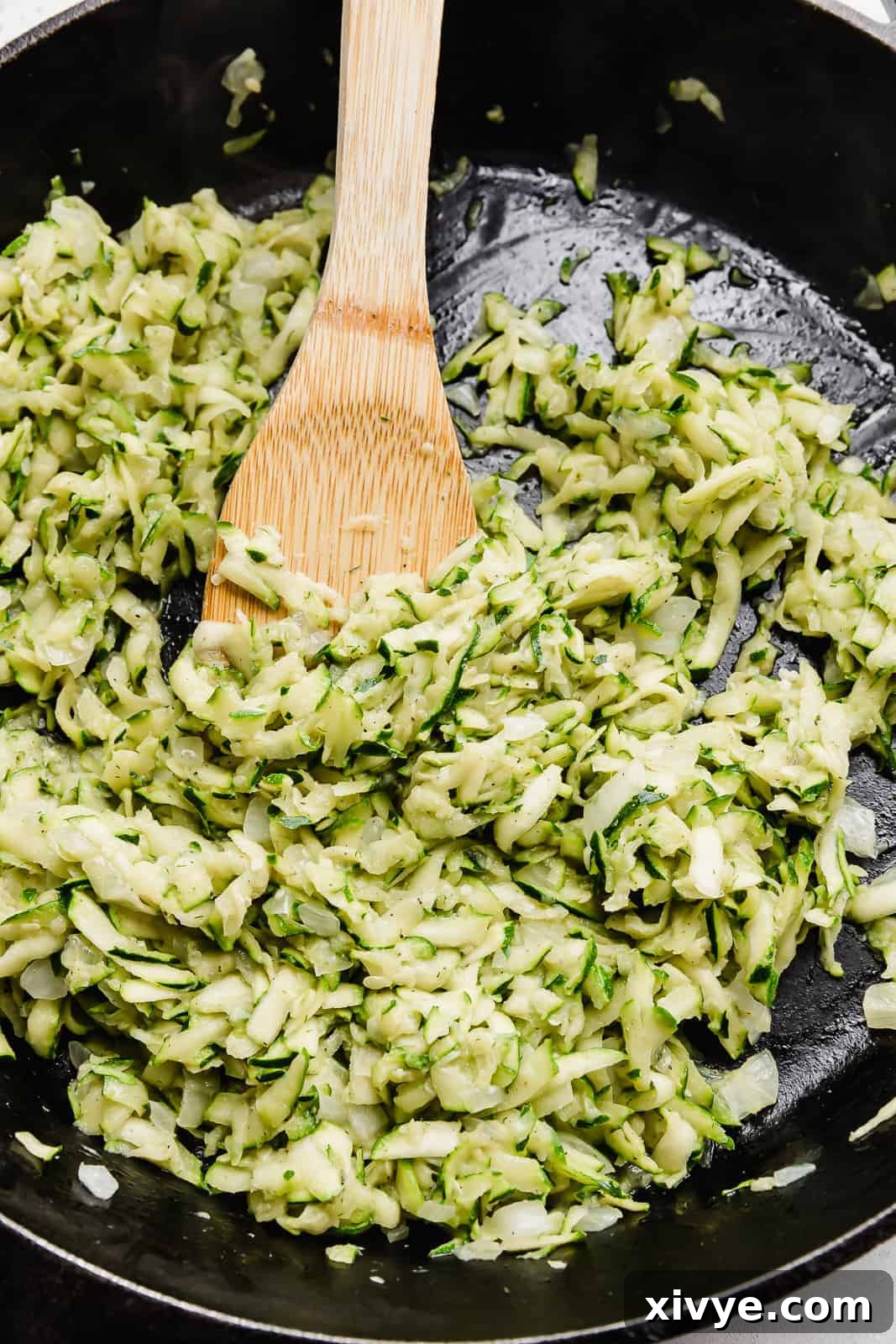 Creamy Zucchini Pasta 6 Cooked down shredded zucchini, ready to be incorporated into the creamy sauce for pasta.