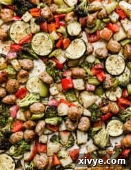 One-Pan Italian Sausage and Roasted Vegetables 10 Sheet Pan Sausage and Veggies on a baking sheet.