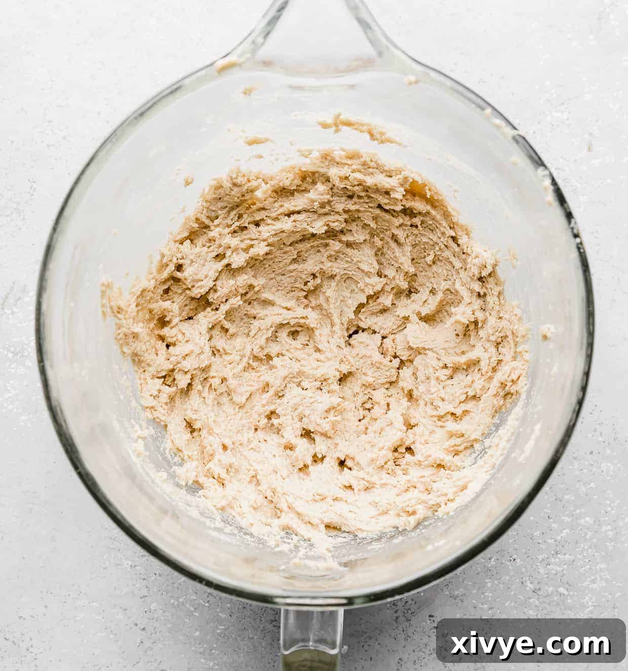 Giant Crumbl Style Chocolate Oreo Cookies 6 Creamed butter and sugar in a glass mixing bowl.