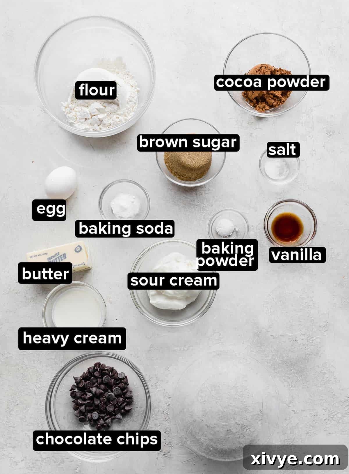 Chocolate Doughnuts ingredients on a gray background.