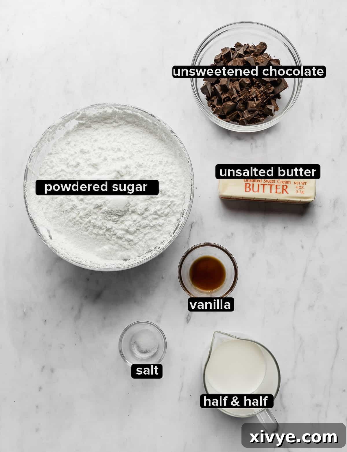Ingredients used to make the chocolate frosting on a chocolate Bundt Cake: ingredients include powdered sugar, unsweetened chocolate, butter, vanilla, half and half, and salt.