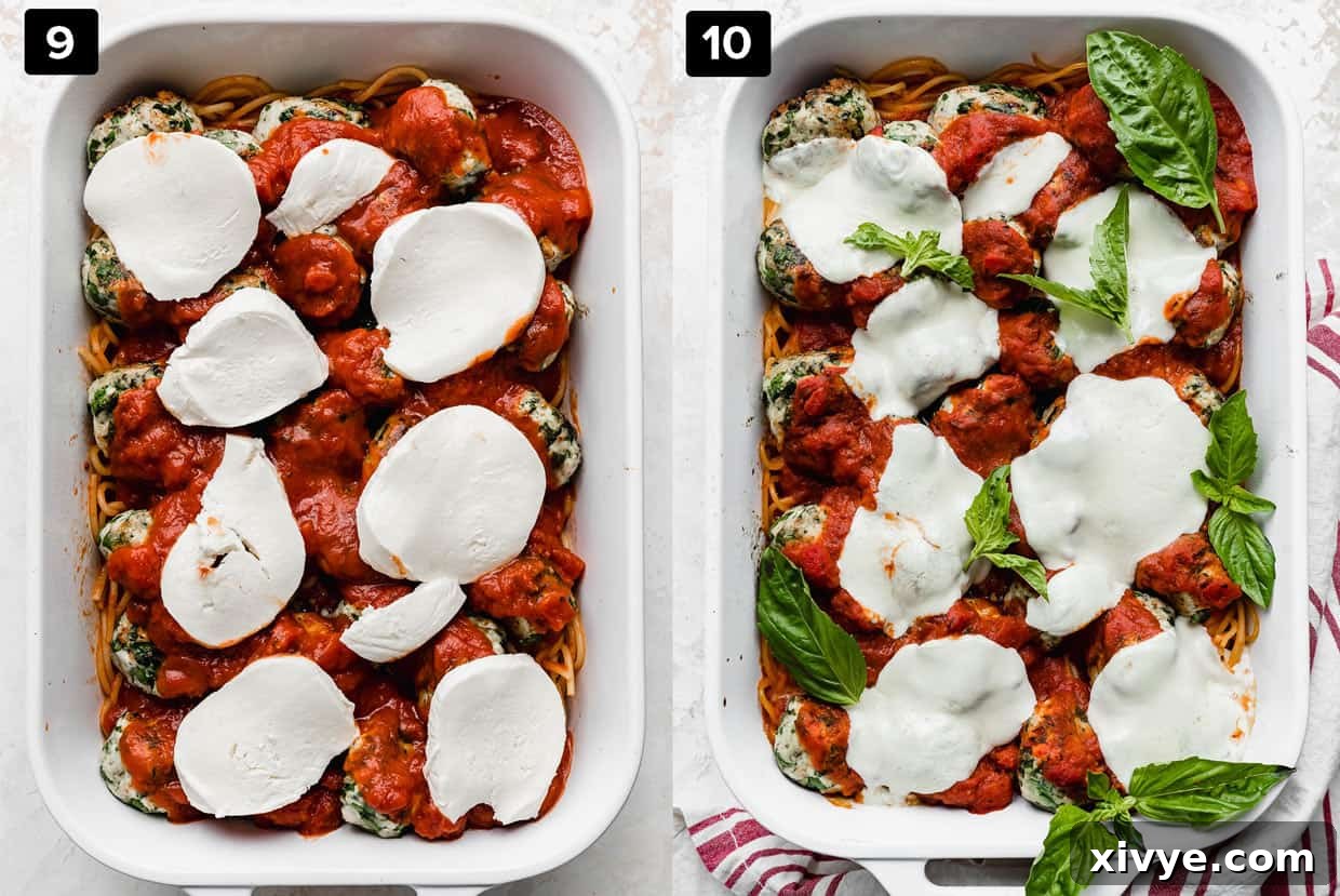 A beautifully baked dish of spinach turkey meatballs and marinara sauce, topped with melted, bubbly mozzarella cheese, fresh from the oven.