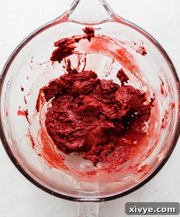Velvet Dream Doughnuts 5 The finished Red Velvet Donut batter, thick and rich in color, beautifully presented in a glass mixing bowl.