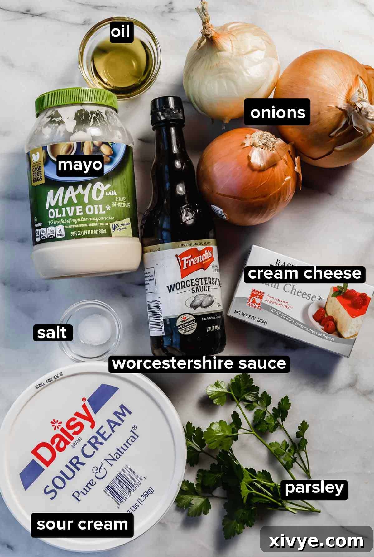 Velvety Onion Cream Cheese Dip 3 Caramelized Onion Dip ingredients on a light gray background.