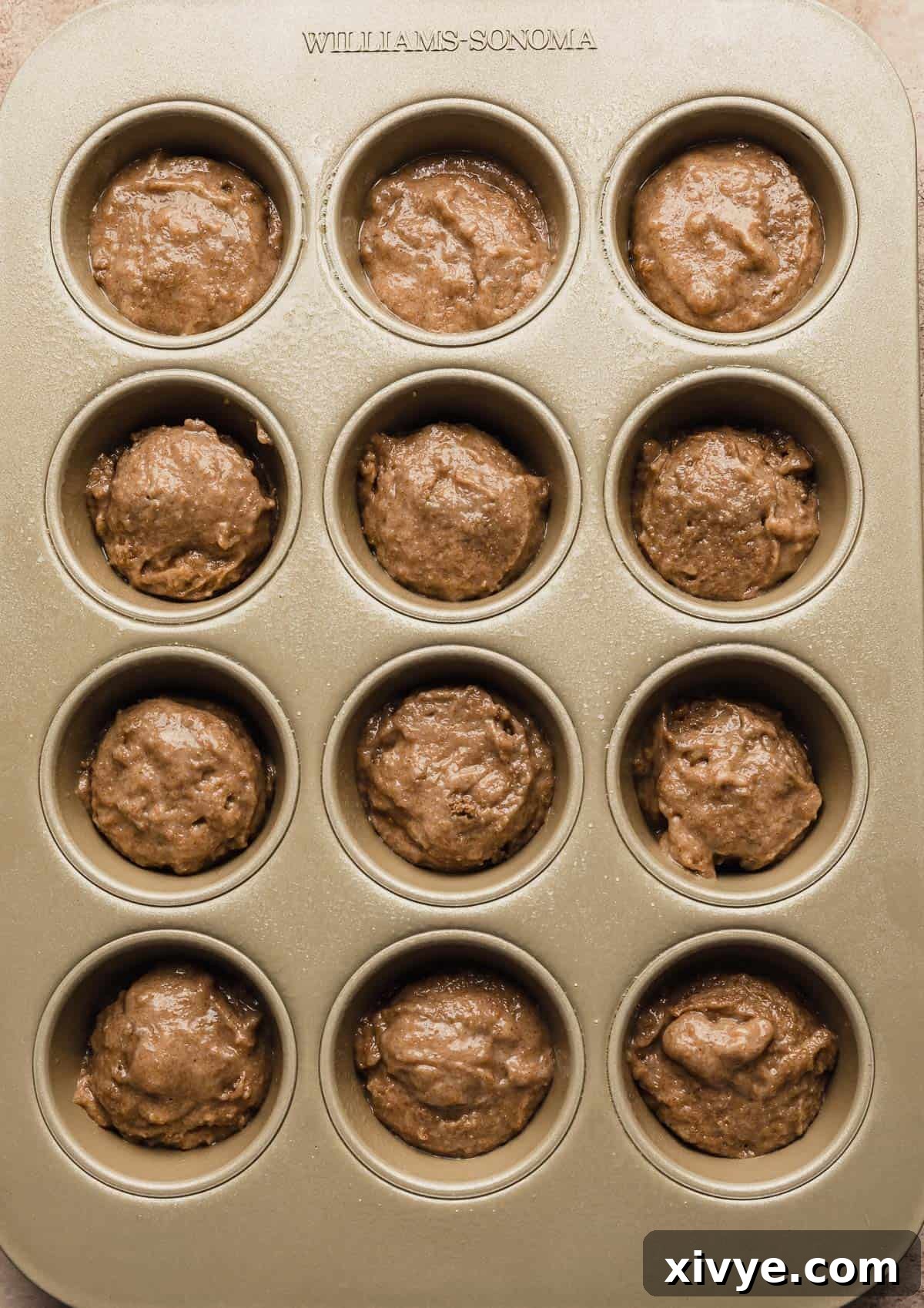 Hearty Buttermilk Bran Muffins 11 A muffin tin filled with all bran muffin batter.