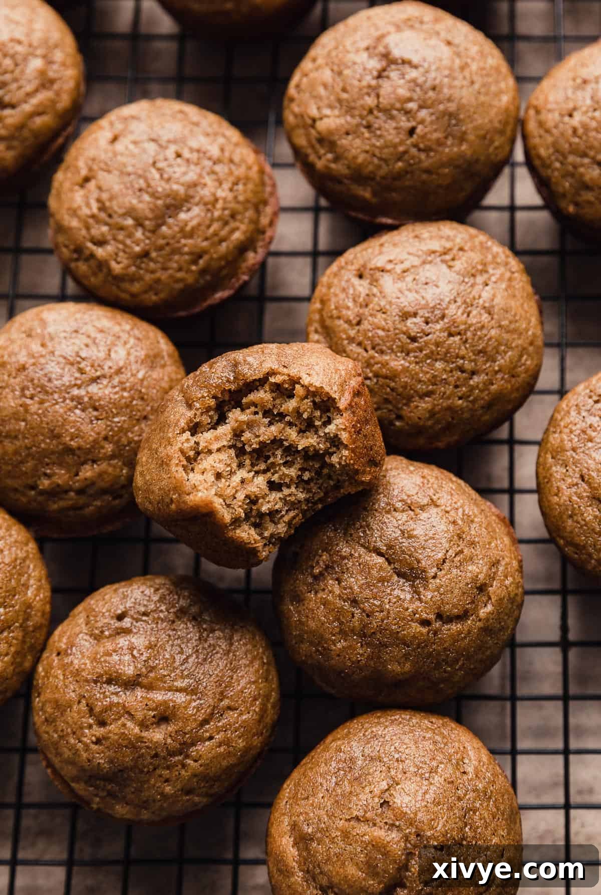 Hearty Buttermilk Bran Muffins 13 Brown All Bran Muffins on a wire cooling rack.