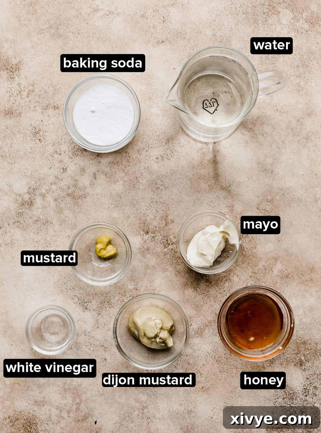 Pillowy Homemade Soft Pretzels 4 Ingredients used to make the baking soda bath for pretzels and a homemade dijon mustard dip.