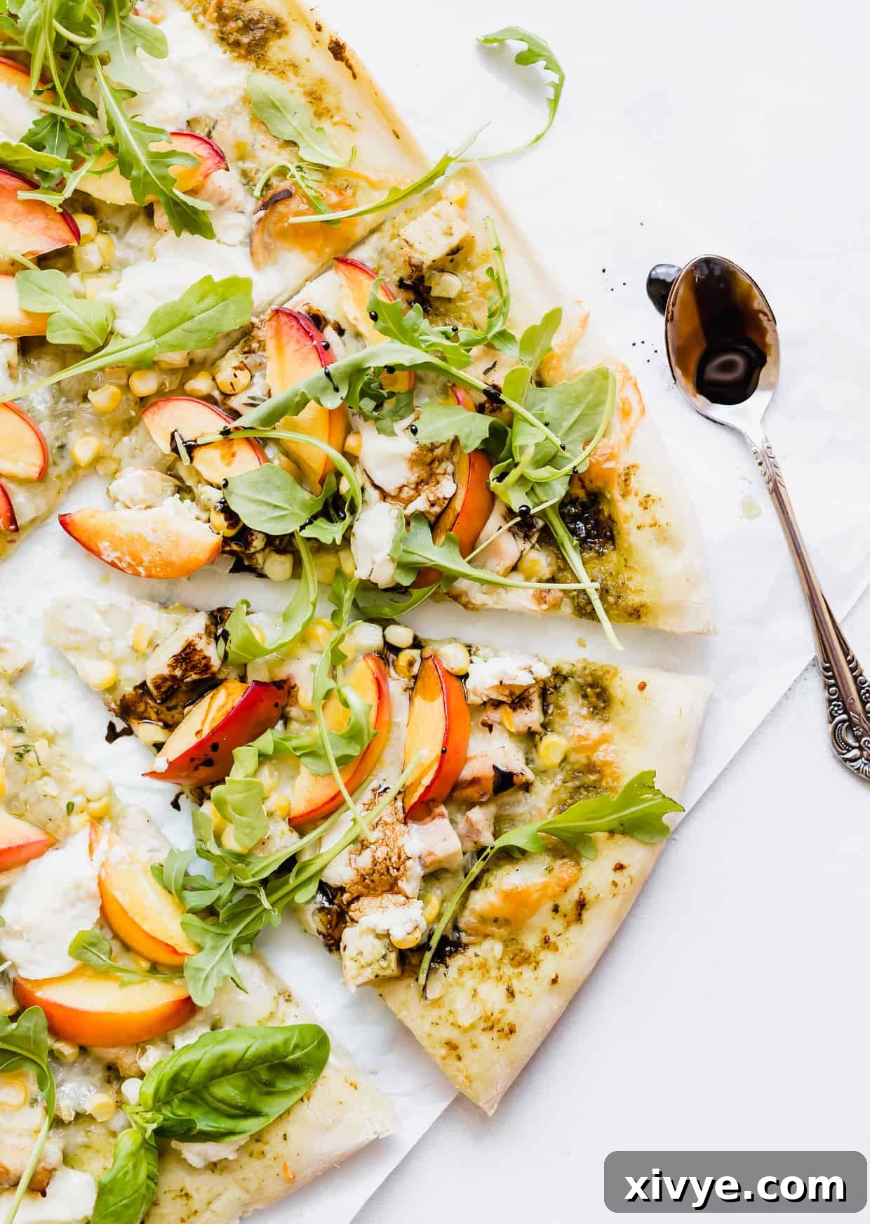 Peppery Rocket Pesto Pizza 7 Arugula pizza with balsamic glaze.