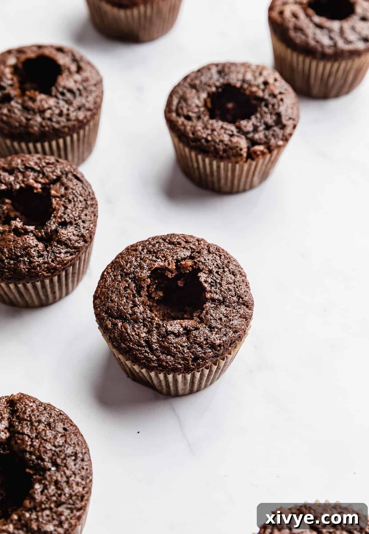 A chocolate hazelnut cupcake with the core removed.