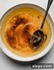 The Secret to Nutty Butter 10 A white bowl with browned butter in it, on a white background.