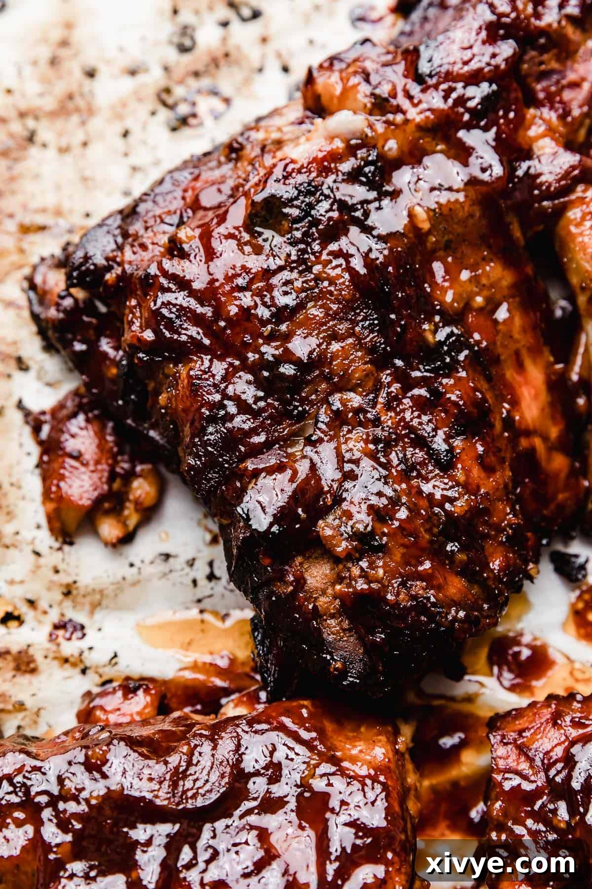 Perfectly charred Coca Cola Ribs, slow-cooked to tender perfection, ready to serve.
