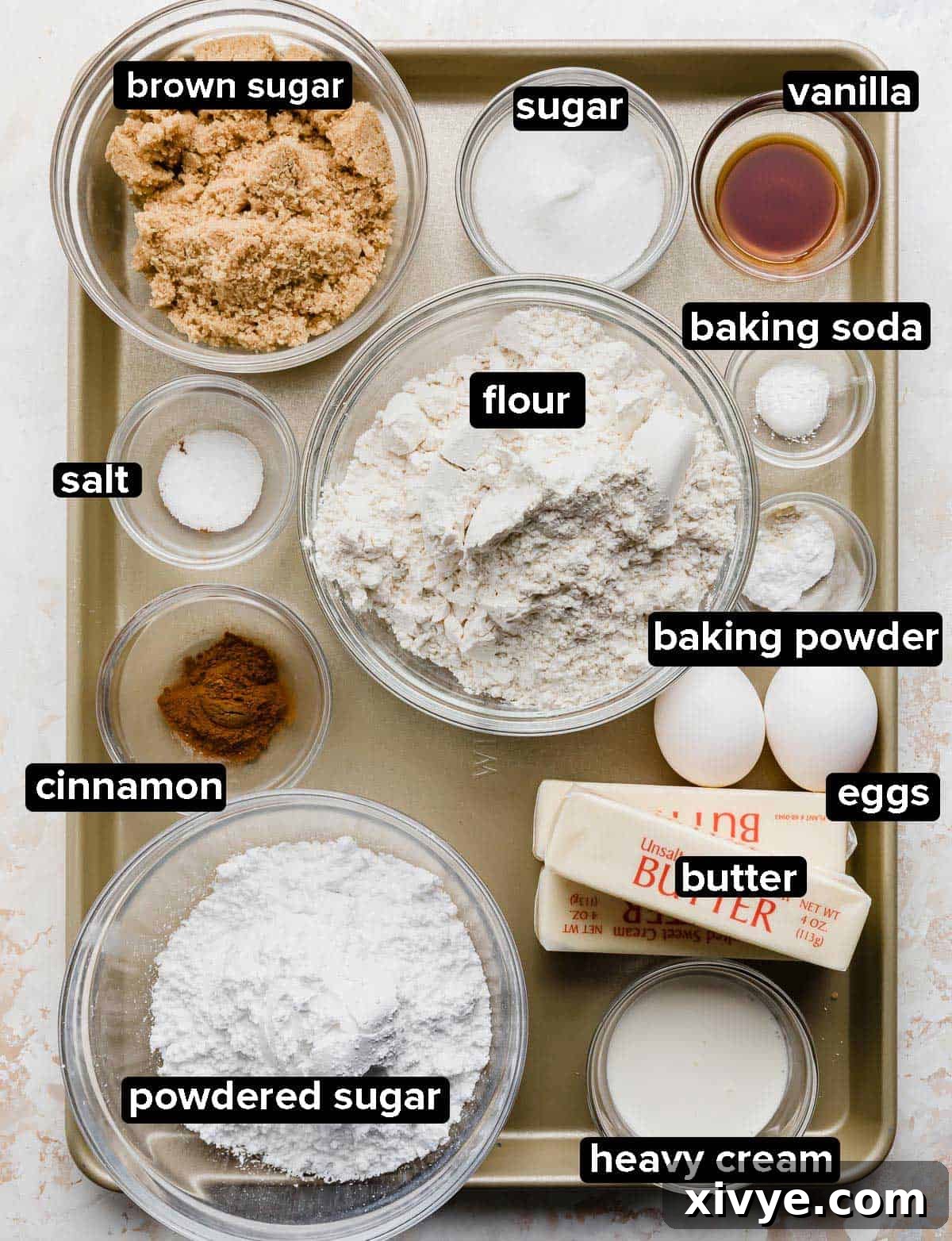 Homemade Crumbl Churro Cookie Perfection 3 All the necessary ingredients for Crumbl Churro Cookies meticulously portioned into elegant glass bowls, ready for baking.