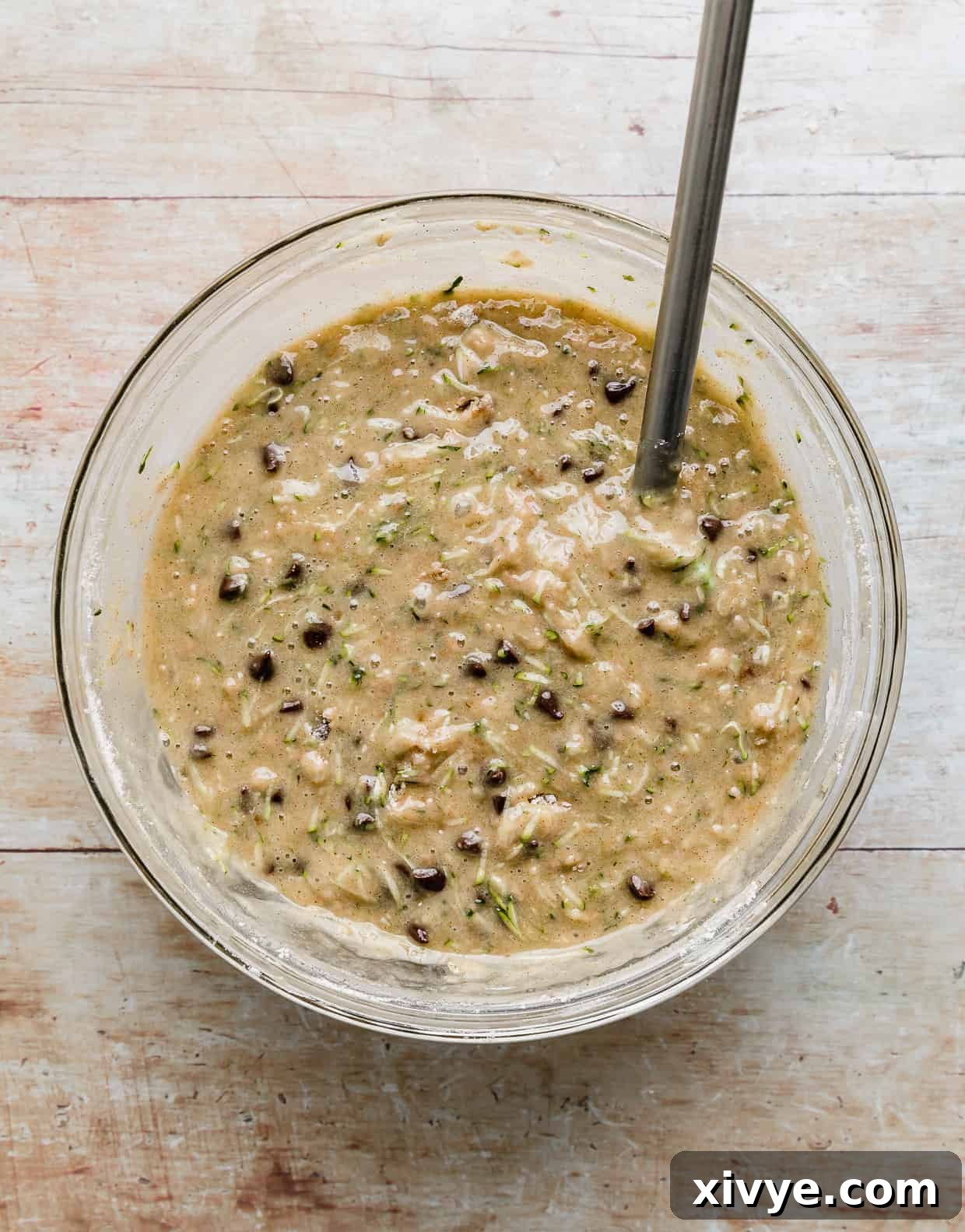 Chocolate Chip Zucchini Bread batter in a glass bowl.