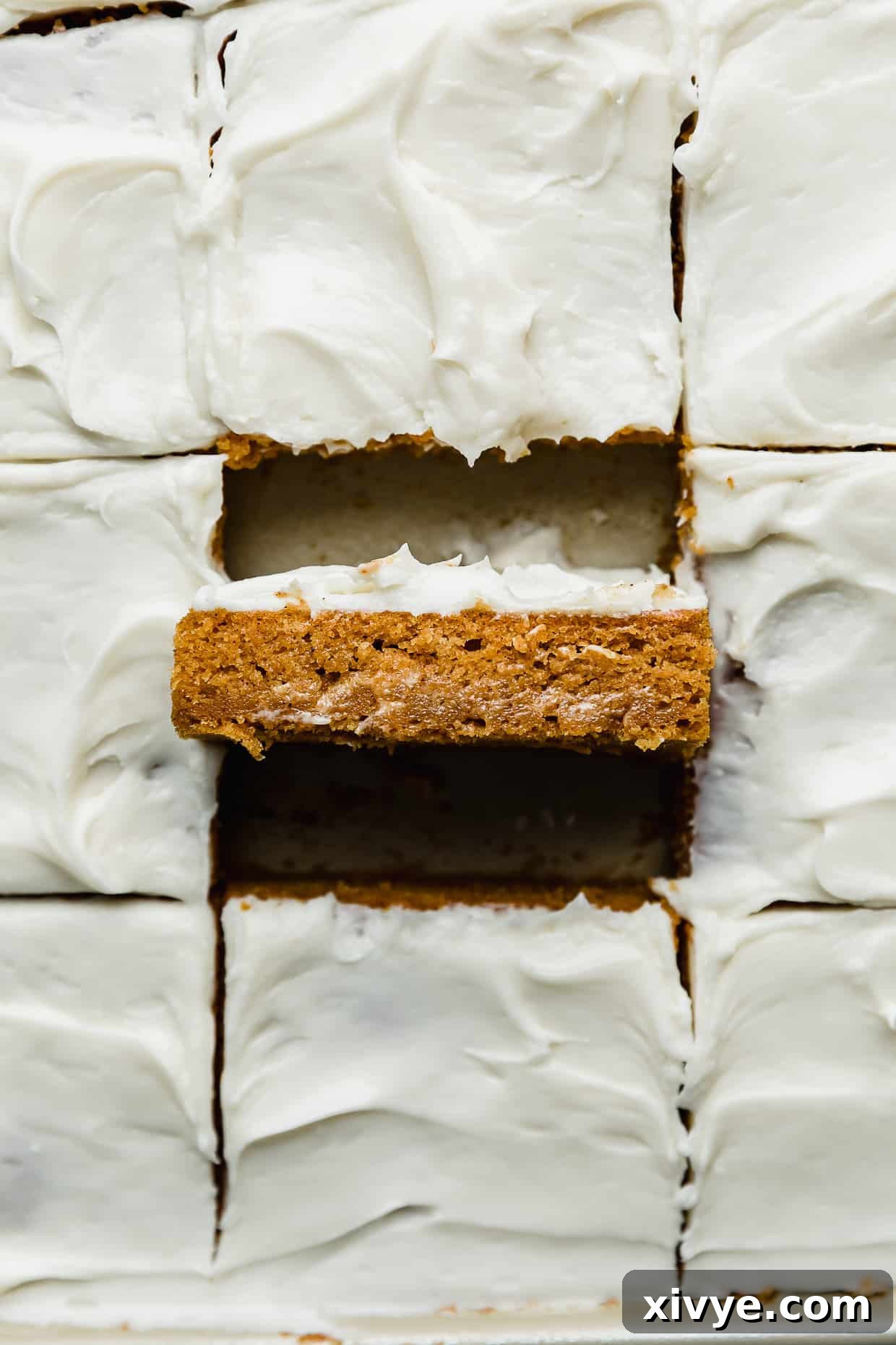 Libby's Pumpkin Bars with cream cheese frosting cut into large squares.