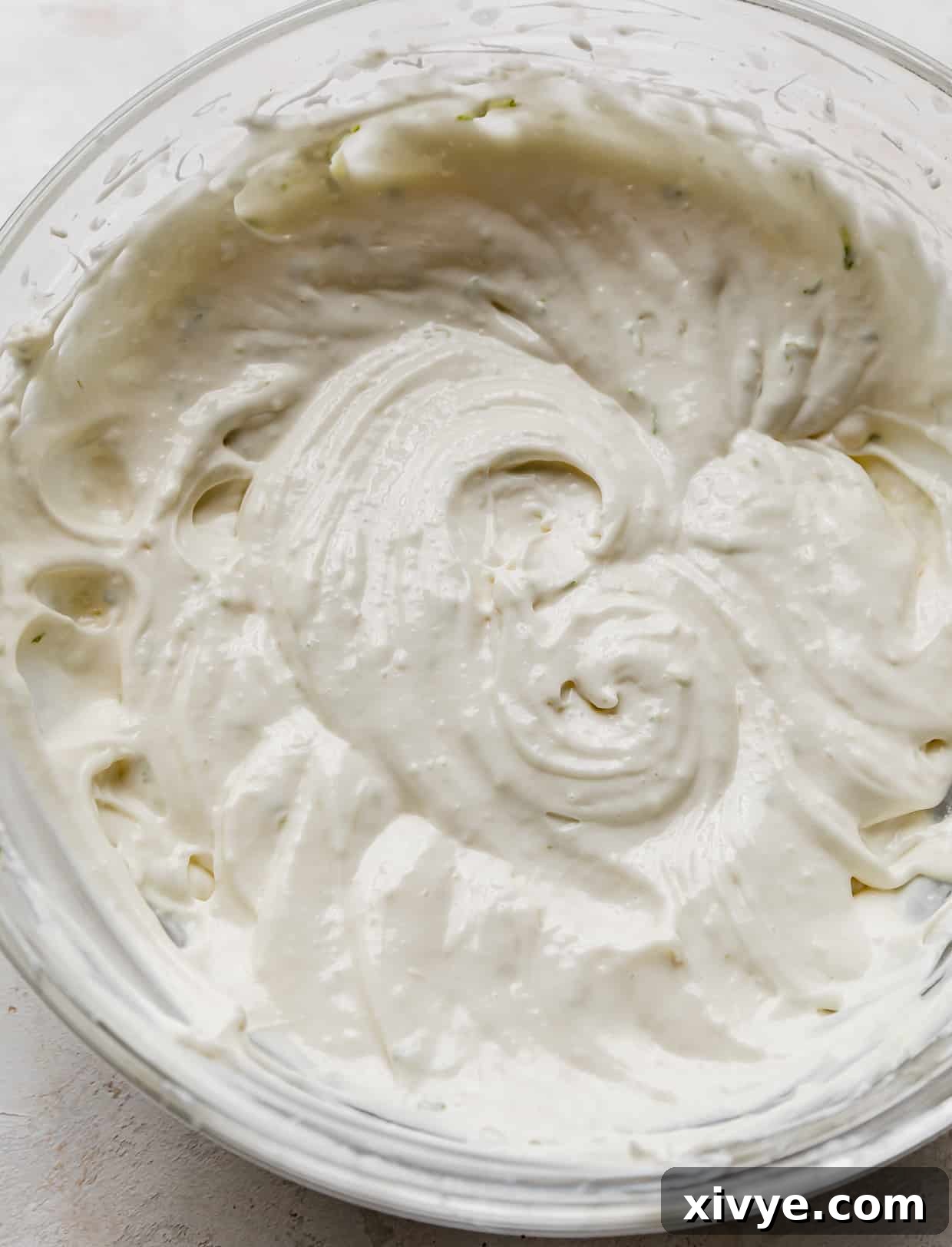 Tangy Key Lime Cookie Delight 8 Key lime pie cheesecake filing in a glass bowl.