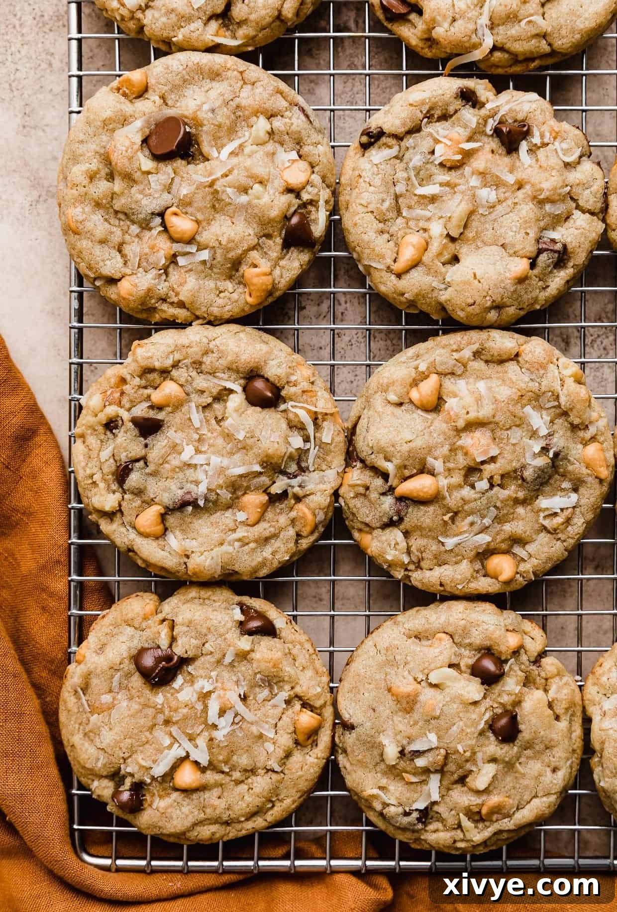 Irresistible Seven-Layer Bars 8 7 Layer Bar Cookies on a wire cooling rack.