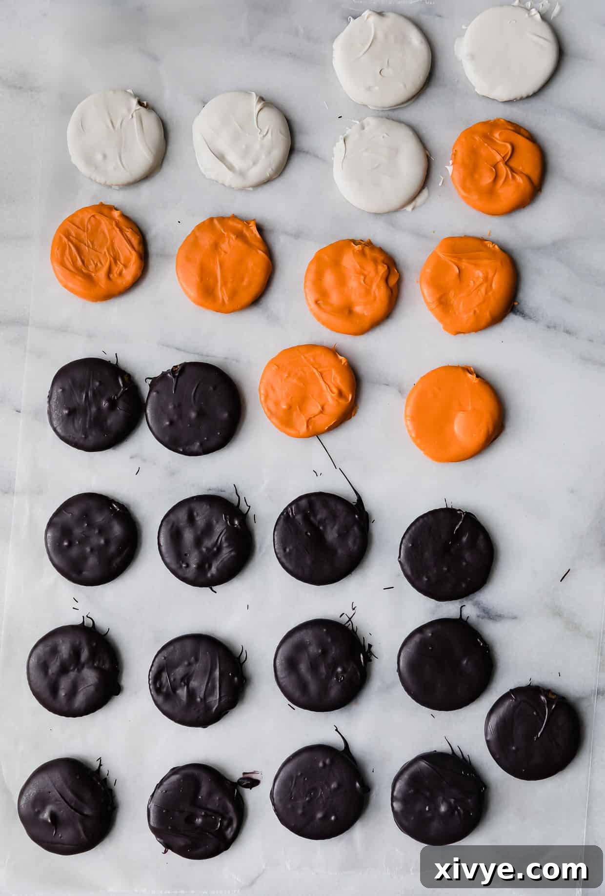 Orange, white, and black covered Halloween Crackers.