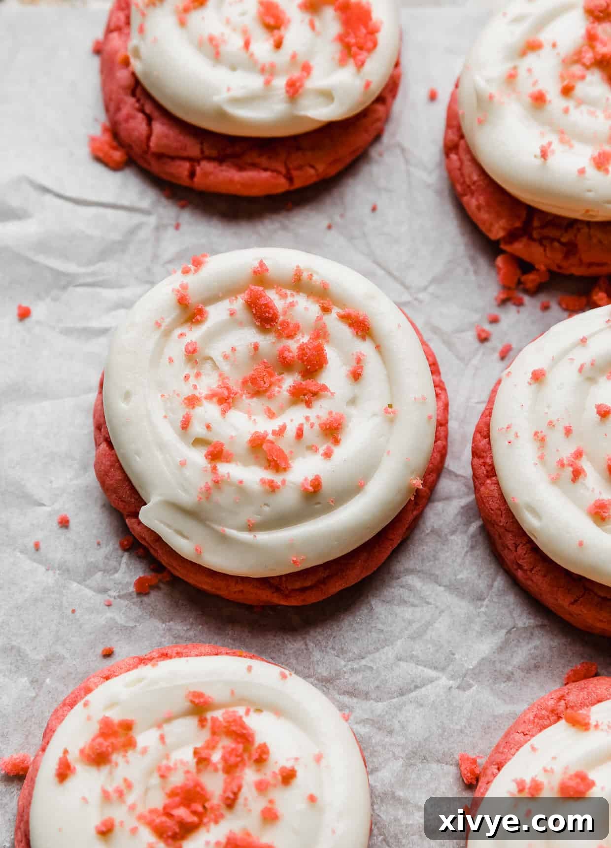 Cream cheese swirled overtop of Pink Velvet Cookies.