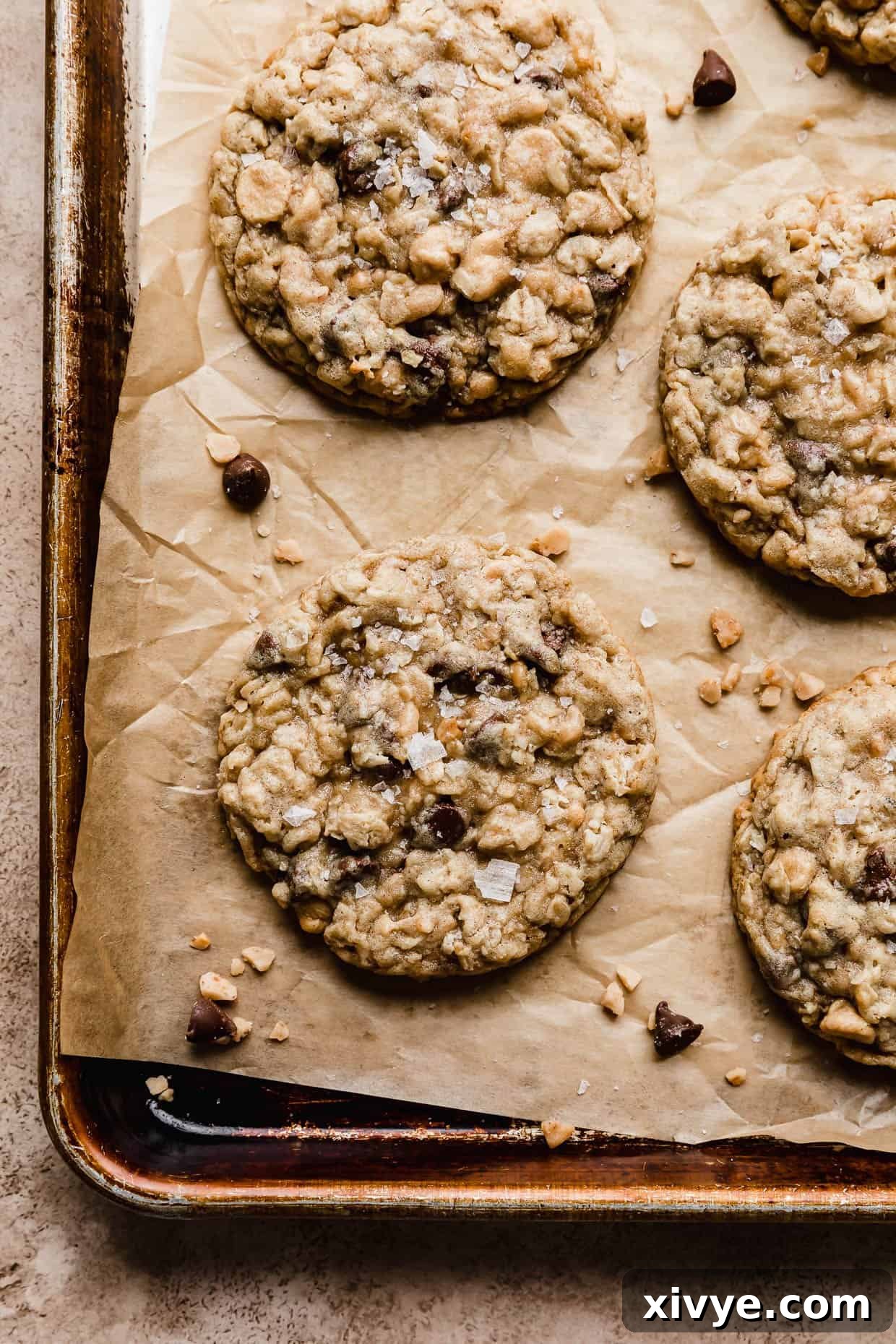 A Mom's Recipe Crumbl Cookie copycat recipe on a brown baking sheet.
