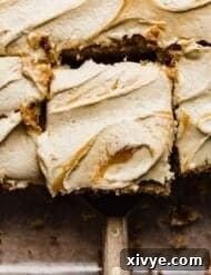 A butterscotch swirled frosting overtop a Butterscotch Cake.