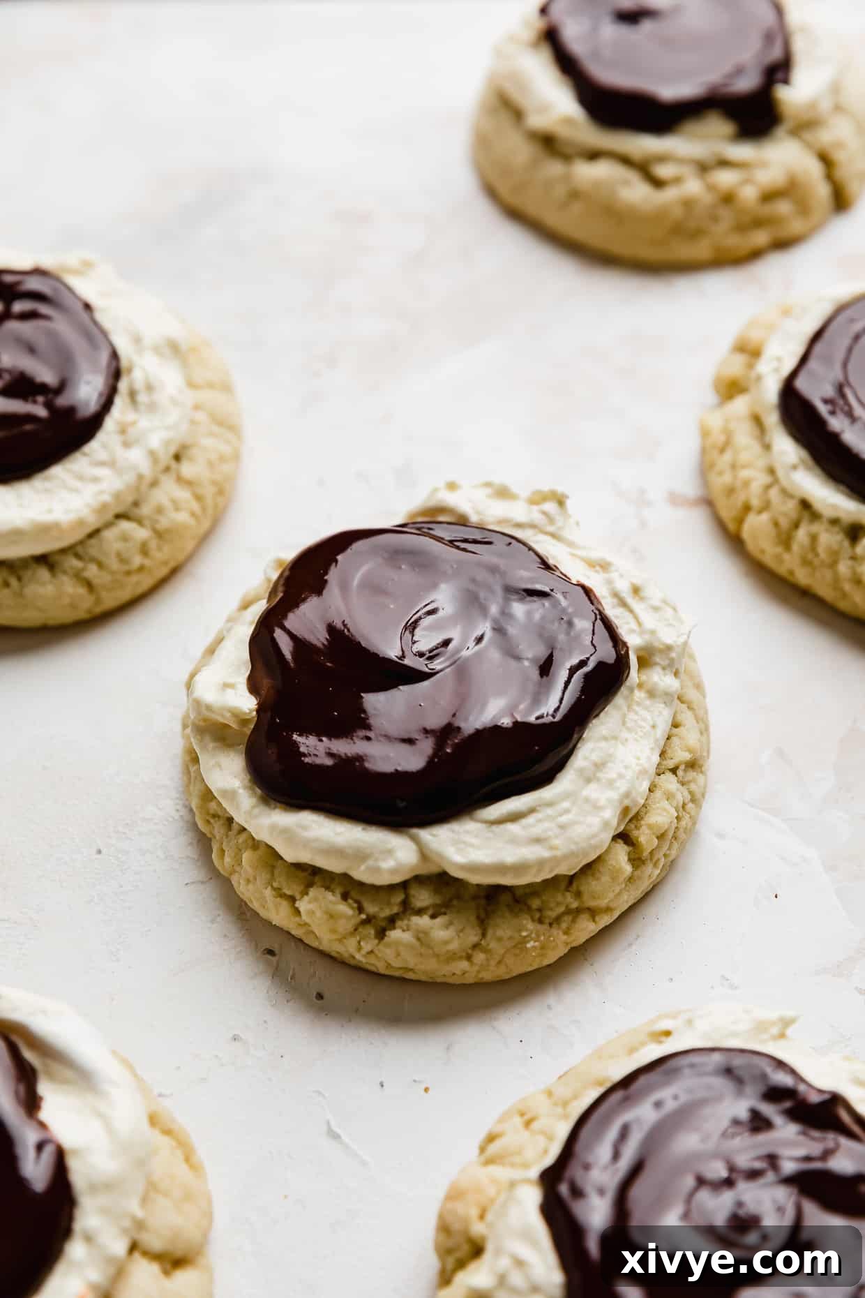 Delicious Boston Cream Pie Cookies with a chocolate ganache topping over vanilla cream.