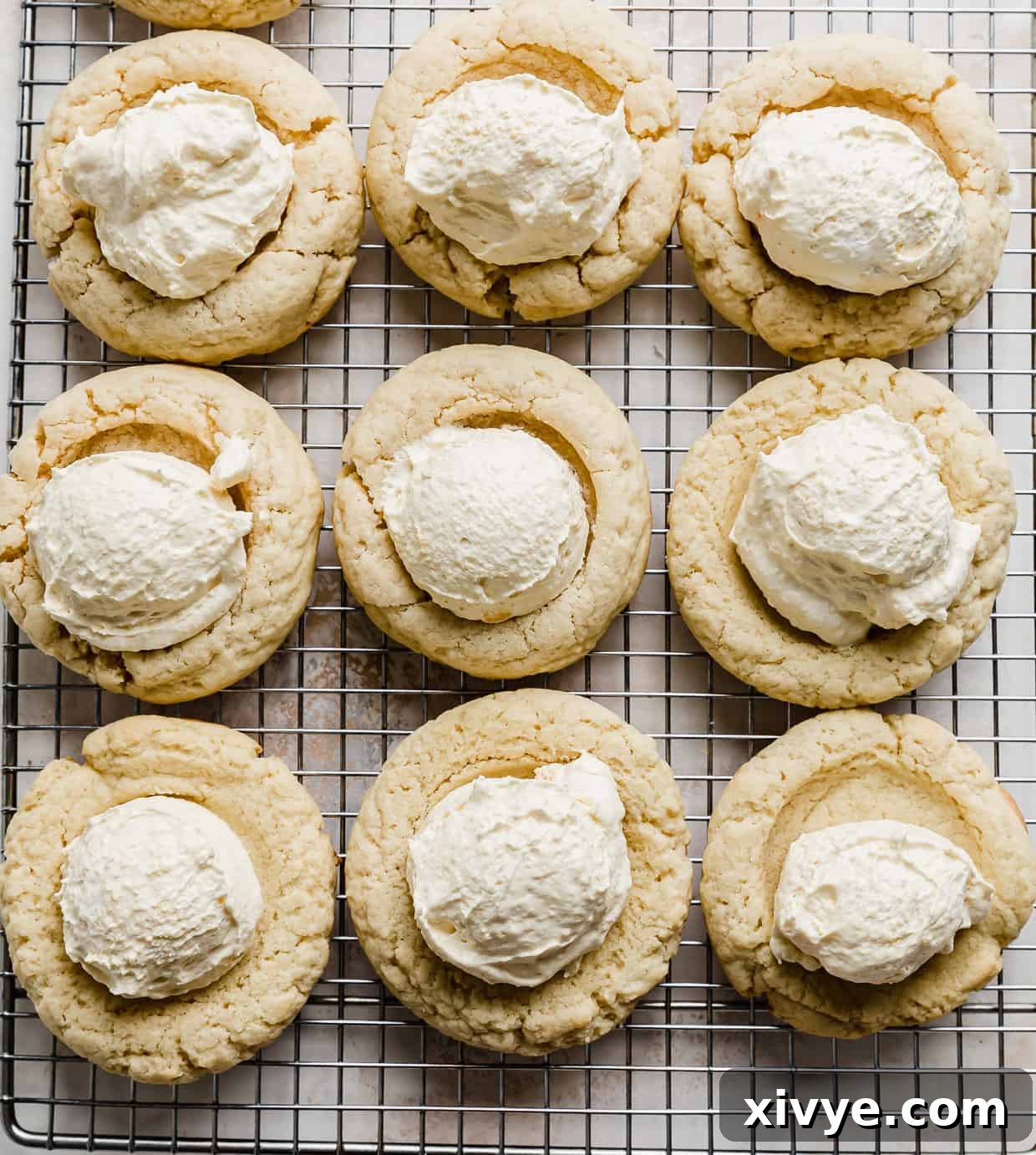 Boston Cream Pie Cookies with a scoop of light yellow vanilla pudding cream in the center.