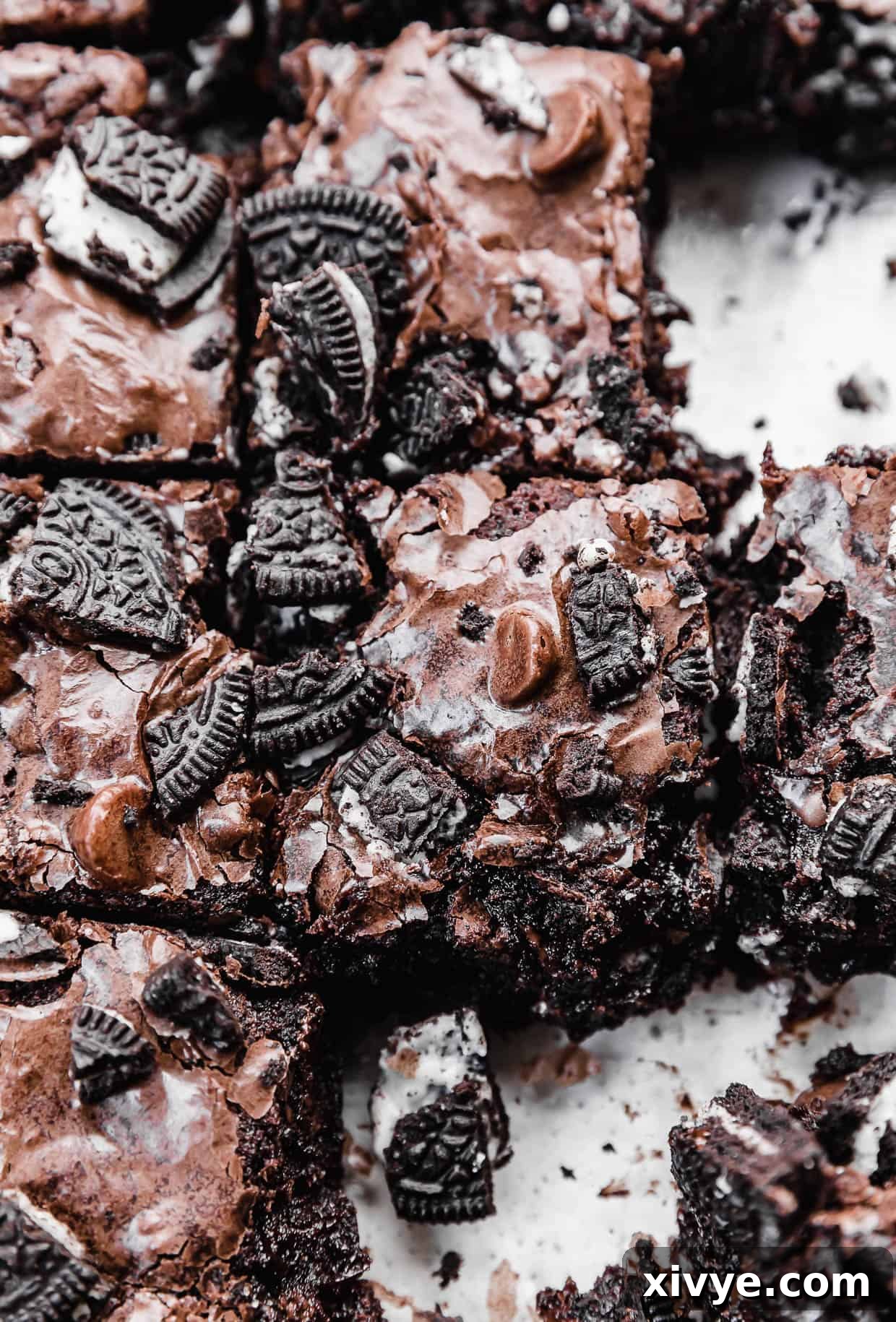Cookies and Cream Fudge Brownies 12 Oreo Brownies in a glass pan topped with chopped Oreos.
