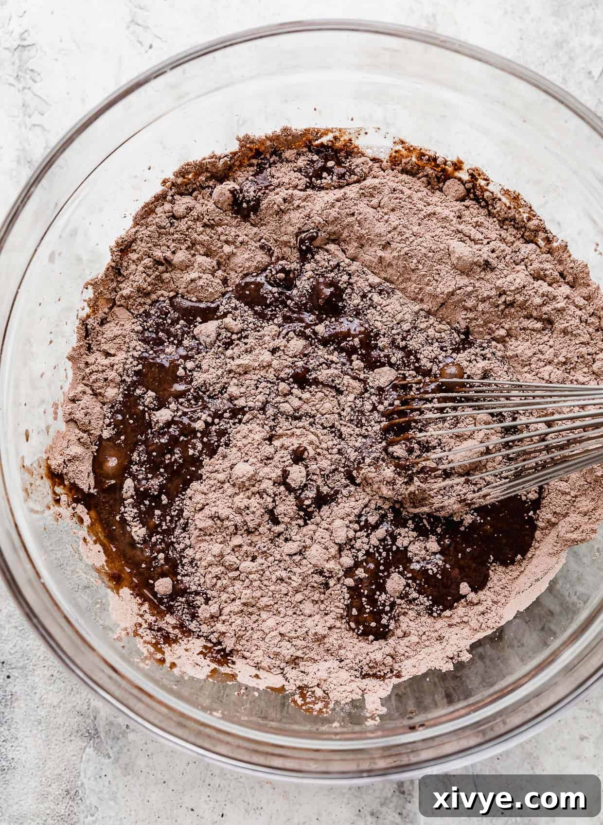 Cookies and Cream Fudge Brownies 4 Brownie batter being mixed in a glass bowl.