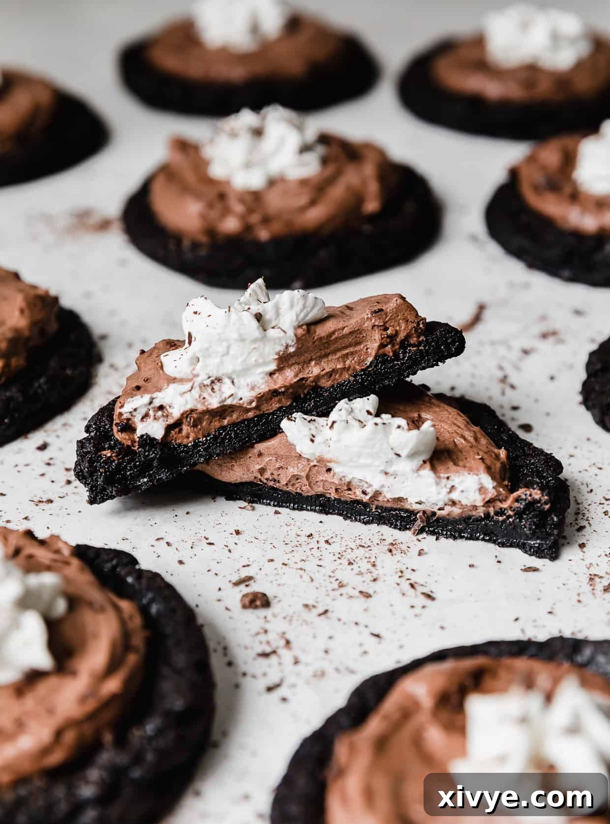 French Silk Pie Cookie cut in half, on a white background.