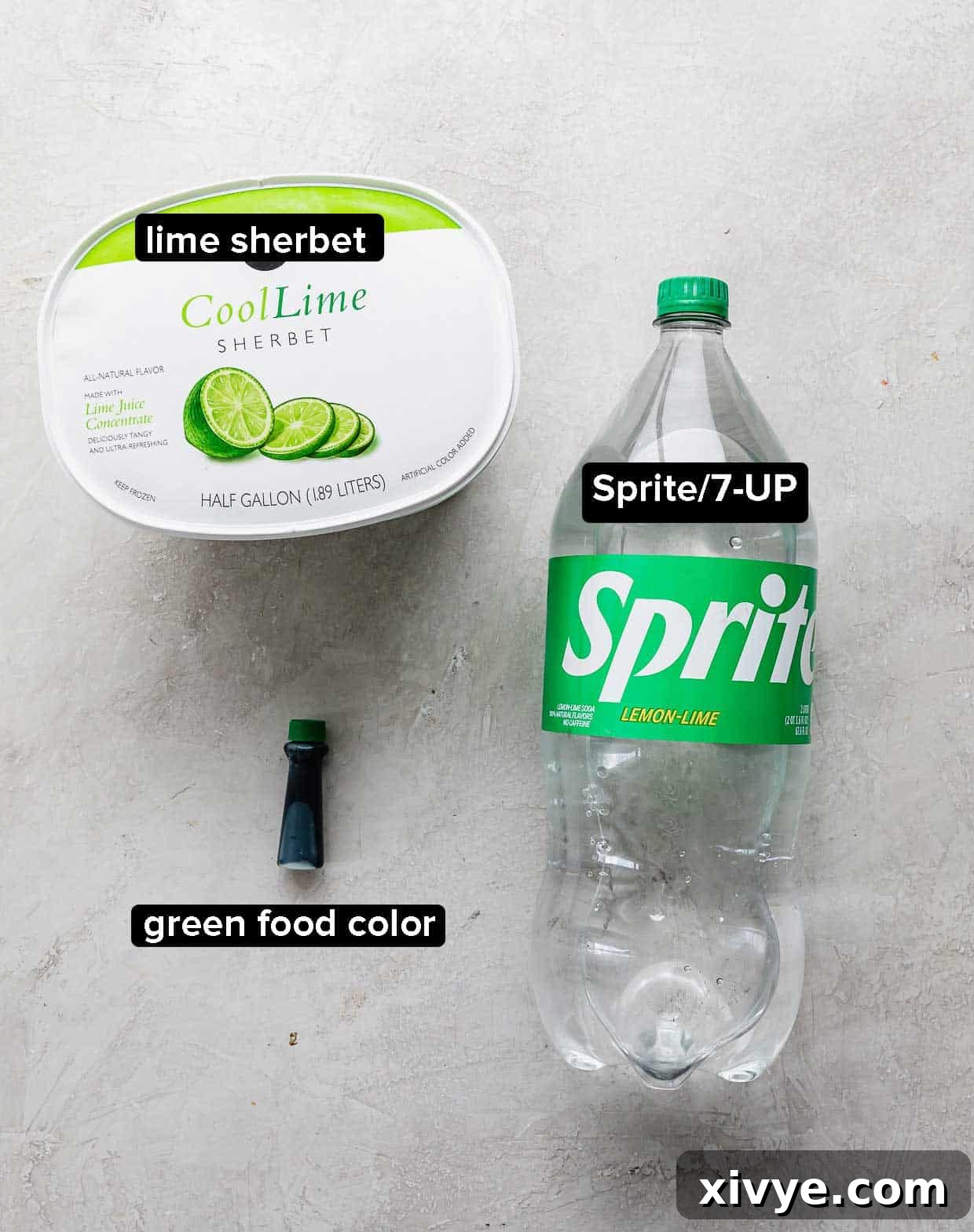 Identity Shifter Brew 3 Ingredients used to make Polyjuice Potion on a gray background: a tub of lime sherbet, a bottle of green food color, and a bottle of Sprite.