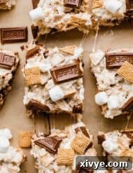 Hershey's chocolate bar and golden graham s'mores Rice Krispies treats on a Kraft background.