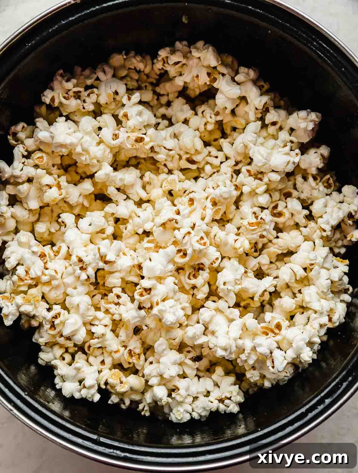 Sweet and Salty Kettle Corn 5 A large pot filled with freshly popped, old-fashioned Kettle Corn Popcorn.