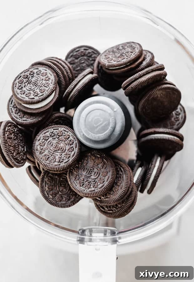 Spooktacular Halloween Oreo Truffles 4 A food processor full of Oreos, in preparation to make Oreo balls.