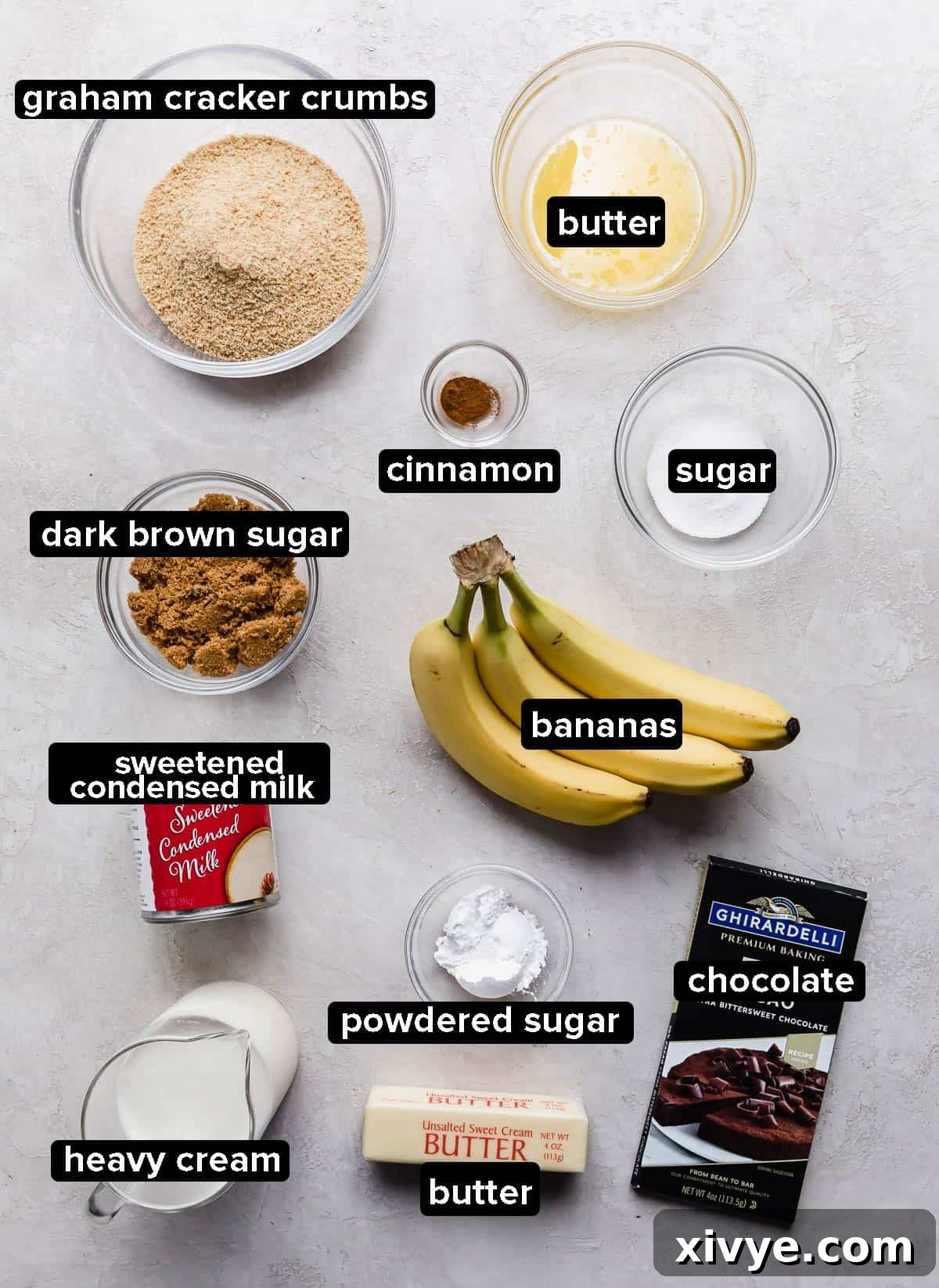 Decadent Banoffee Pie with Crunchy Graham Crust 3 Banoffee Pie ingredients on a gray textured background.