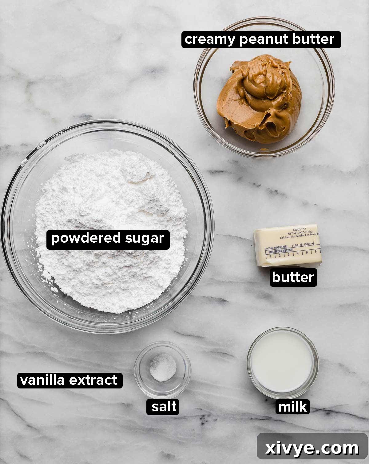 Ingredients used to make the peanut butter layer in Buckeye Cookies: powdered sugar, peanut butter, value, salt, milk, and butter all on a white background.