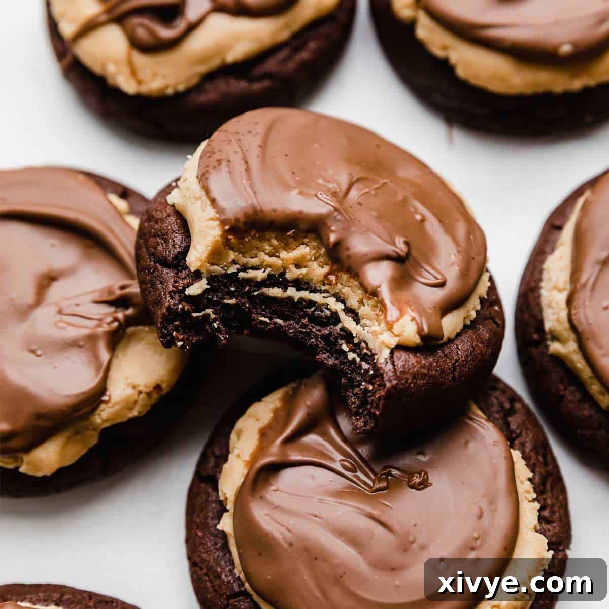 A Buckeye brownie Cookie with a bite taken out of it.