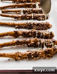 Caramel pretzels topped with toffee bits.