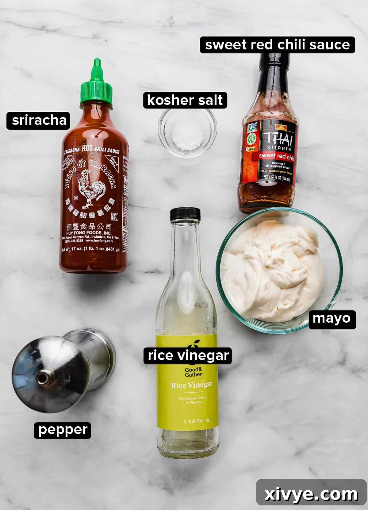 Ingredients used to make Bang Bang Sauce using mayo Thai sweet chili sauce, rice vinegar and sriracha. 