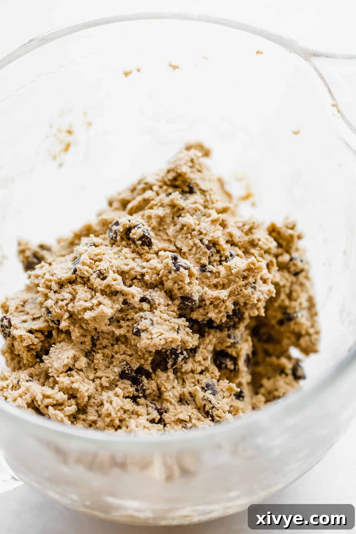 Caramelized Butter Chocolate Chip Cookies 8 Rich Brown Butter Chocolate Chip Cookie dough in a glass stand mixer bowl, perfectly mixed and ready for chilling.