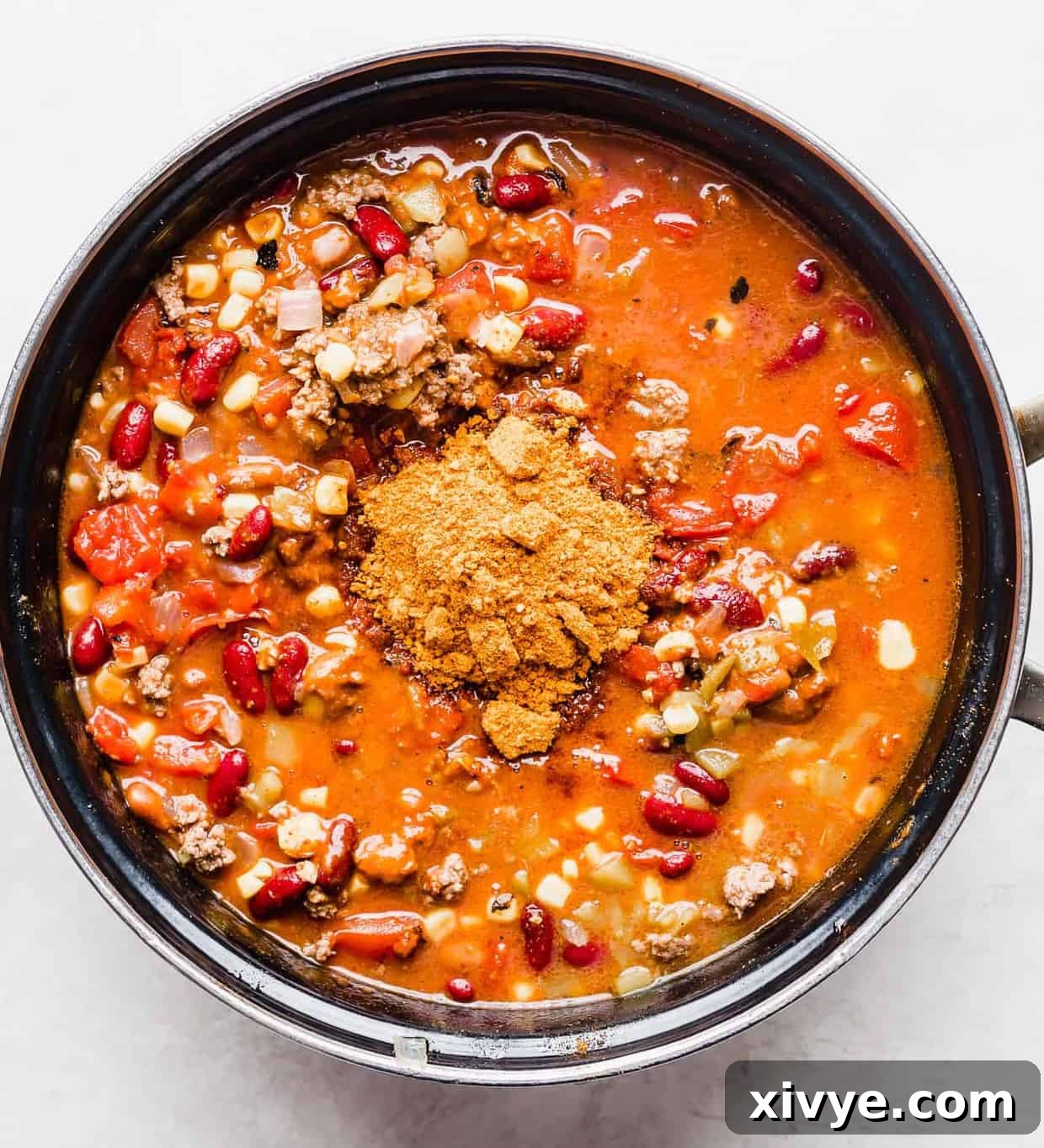 A large pot full of taco soup.